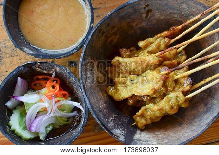 Pork Satay. grilled pork served with peanut sauce or sweet and sour sauce