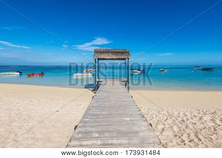 Le Morne Mauritius - December 11 2015: Beautiful gazebo on the tropical white sandy beach in the Le Morne Bay Mauritius.