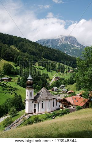 Beautiful pilgrimage church of Maria Gern with the mountain Watzmann in Bavarian Alps
