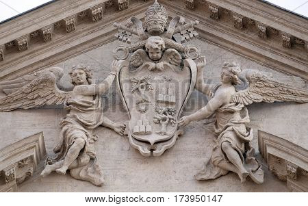 ROME, ITALY - SEPTEMBER 01: Coat of arms of Pope Alexander VII Chigi on the portal of Sant Andrea della Valle Church in Rome, Italy on September 01, 2016.