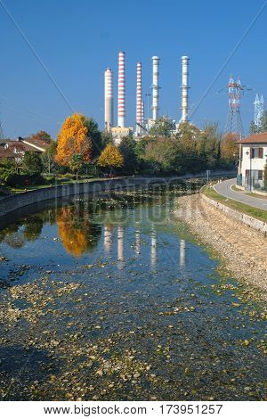 Turbigo (Milan Lombardy Italy): industrial chimneys along the Naviglio Grande