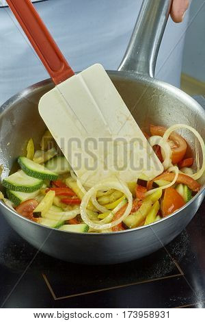 chef salad mixing bowl in a series full of food recipes Food being prepared and cooked in a contemporary kitchen, with and without the chef