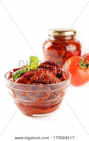 Italian appetizer - sundried tomato in bowl and glass jar.