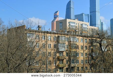 Moscow, Russia - March, 2017: Five-story Brick Residential House Against The Backdrop Of Buildings O