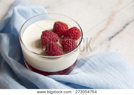 Panakota Dessert With Berries On The Background Of A Beautiful Beige Napkin