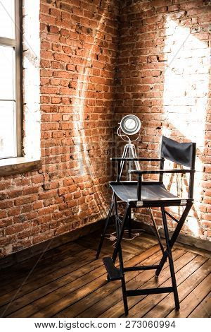 Directors Chair. Reflector Lamp Light From Window, Solar