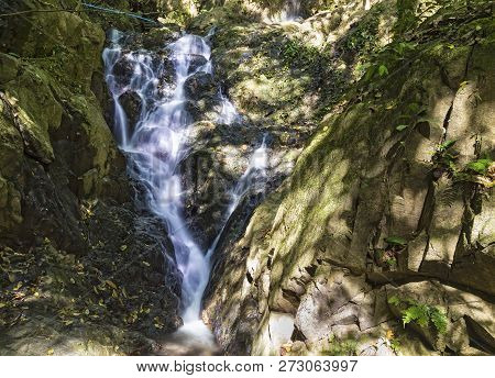 Waterfall Among The Rocks In The Jungle. Khao Phra Thaeo National Park, Phuket Island,  Thailand. Ph