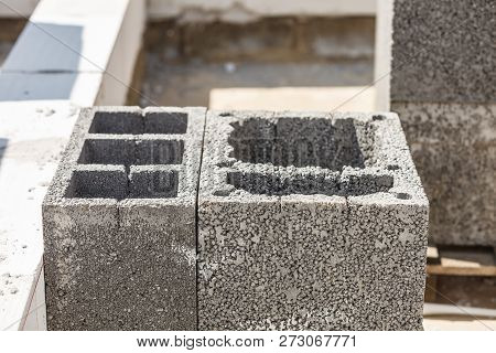 Close Up Of Grey Airbrick With Holes. Industrial Construction Site Objects Concept.