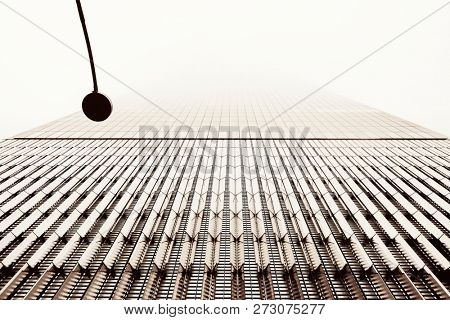 NEW YORK CITY - NOV 12: Downtown skyscrapers in a foggy day on November 12, 2014 in Manhattan, New York City. With population of 8.4M, it is the most populous city in the United States.