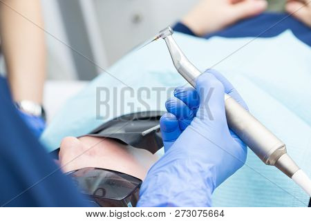 Close-up Picture Of Dental Instruments: Drill And Needle For Root Canal Treatment And Pulpitis In Ha