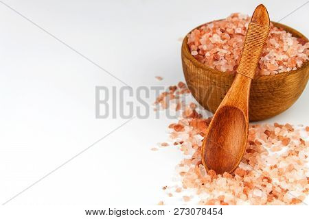 Pink Salt From The Himalayas On White Background. Pile Of Pink Himalayan Salt. Sale Of Spices.