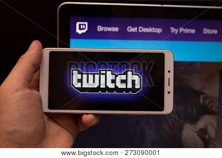 Tula, Russia - October 31, 2018: A Man Holds Edge Mobile Phone With Twitch Application On The Screen