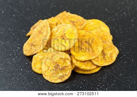 Pile Of Crunchy Sliced Dehydrated Plaintain Fruit Chips