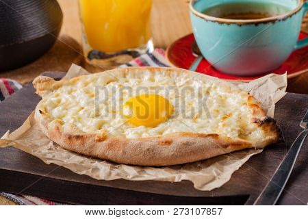 Khachapuri - Traditional Tortillas With Eggs Of Georgian Cuisine. Served With Spices Instead Of Brea