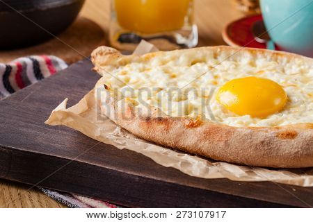 Khachapuri - Traditional Tortillas With Eggs Of Georgian Cuisine. Served With Spices Instead Of Brea