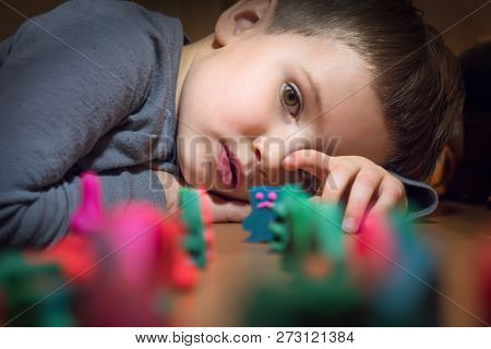 Boy And Toys. Colorful Toys Made From Plasticine.