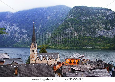 Scenic View Of Famous Hallstatt Mountain Village With Hallstatter Lake. Sunny Autumn Sunrise On Hall