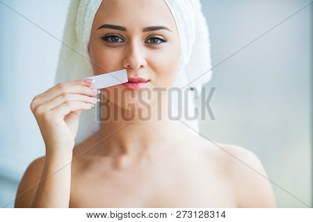 Hair Removal Wax. Young Woman Reciving Facial Epilation