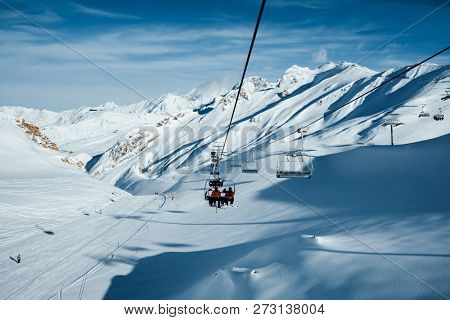 Sunny winter day, skiing area in the Paznaun valley. Location place famous ski resort Silvretta Arena Ischgl/Samnaun on the Swiss Austrian border. State of Tyrol, Europe. Discover the beauty of earth.