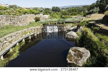 View Of A Recreational Swimming Facility Created On A Small River Near The Roman Bridge In The Villa