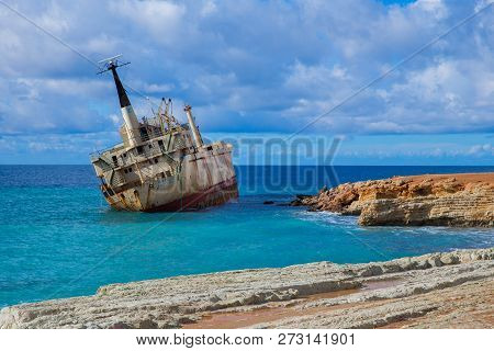Old Ship Wreck And Blue Water Beach. Travel Photo 2018, December. Landscape And Nature.