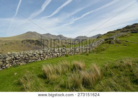The Scafell Pike Range Of Hills Seen From The Hard Knott Fort In The English Lake District