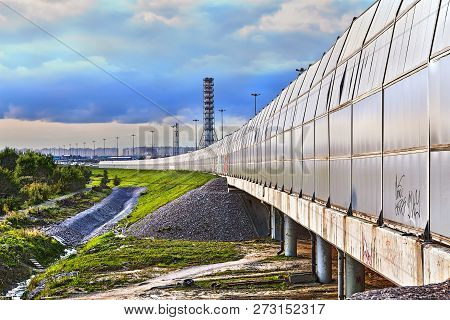 St. Petersburg, Russia - August 28, 2018: View Of The Bypass Road Fence Barrier From Outside With Ci