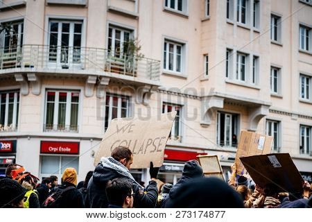 Strasbourg, France - Dec 8, 2018: We Collapse Message On Placard As Crowd Marching In Central Strasb