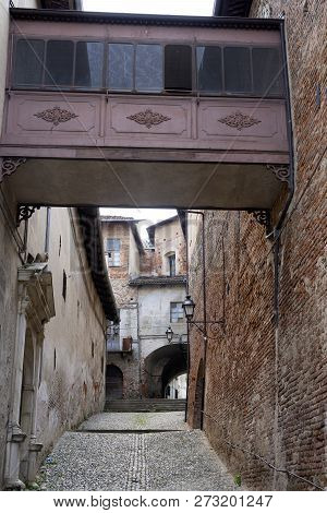 Saluzzo, Cuneo, Piedmont, Italy: Historic Buildings Along An Old Typical Street