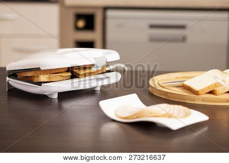 Detail Of Hot Sandwiches Being Prepared In A Sandwich Maker. Selective Focus On The Sandwiches