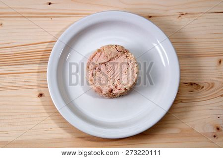 Looking Down At Solid White Albacore Tuna Fish On White Plate Still Shaped Like The Can It Came In O