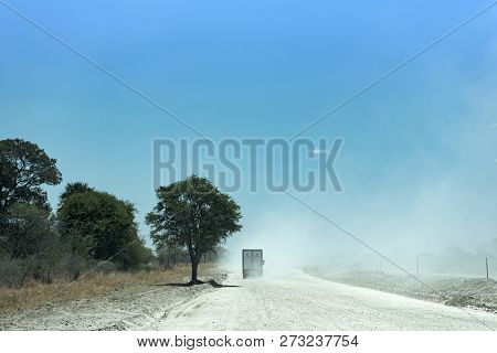 Truck On A Dirt Gravel Road In Botswana
