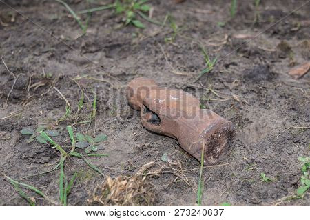 This Ball Peen Hammer Has No Handle And Has Been Abandoned In The Dirt. Bokeh Effect.