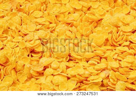 Corn-flakes Background And Texture. Top View. Cornflake Cereal Box For Morning Breakfast.