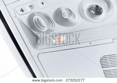 Reading Light, Air Conditioner Control And Signage Panel On The Aircraft Saying Smoking Is Not Allow