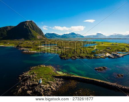 Scenic Seascape With Lighthouse At Hovsund Fishing Port, Gimsoya Lofoten Islands In Norway