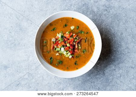 Traditional Konya Bulgur Soup Batirik With Sliced Cucumber, Tomatoes, Onion And Parsley
