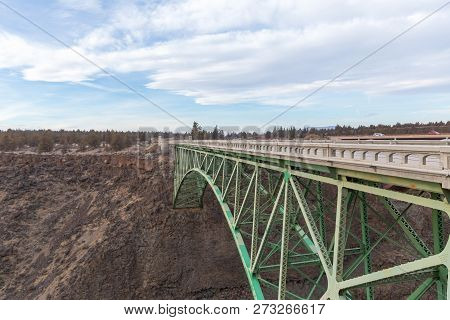 View Of Steel Arch Bridge As Seen From Peter Skene Ogden Park Near Terrebonne, Oregon.