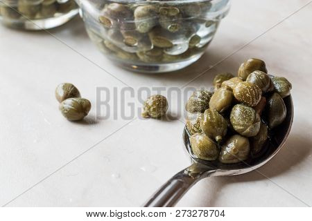 Edible Capers In Spoon Ready To Eat.