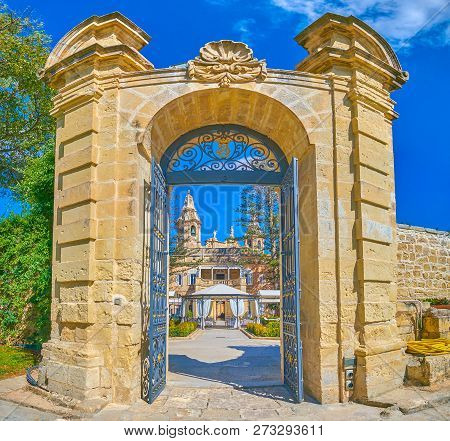 Naxxar, Malta - June 14, 2018: The Beautiful Gates That Separates Inner Courtyard Of Palazzo Parisio