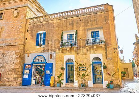 Mdina, Malta - June 14, 2018: The Historical Edifice In Mdina Fortress With  Souvenir And Glass Shop