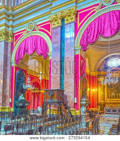 Mdina, Malta - June 14, 2018: The Arcades Between Nave And Aisles Decorated With Marble Pilasters An