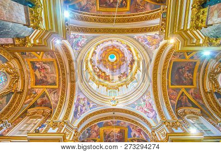 Mdina, Malta - June 14, 2018: The Cupola And Transepts Of Metropolital Cathedral Covered With Beauti