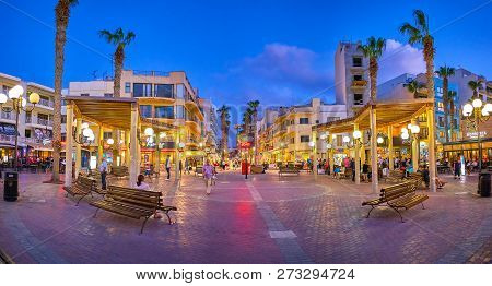 Bugibba, Malta - June 14, 2018: The Bay Square Is Surrounded By Gourmet Streets, Full Of Restaurants