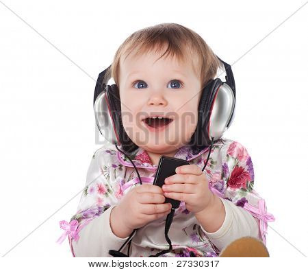 Smilende baby med hovedtelefon
