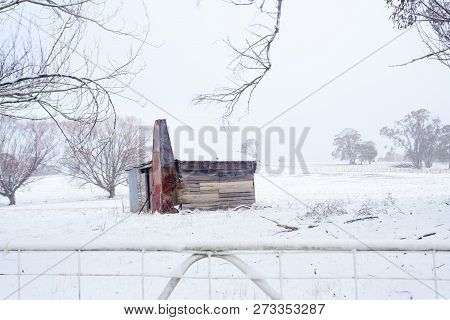 Ramshackle Rustic Timber Shack With Metal Chimney Of Rusting Red Patinas And Corrugated Iron Roof Co