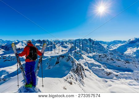 Skitouring with amazing view of swiss famous mountains in beautiful winter powder snow of Alps. 