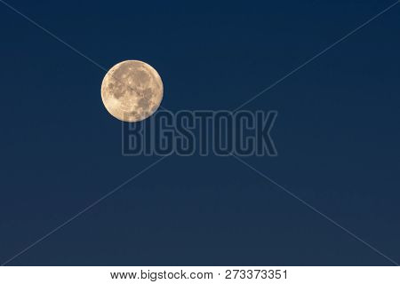 Full Moon In Daytime In Blue Hour