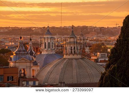 View Of Rome Historic Center Skyline With Ancient Domes And Bell Towers At Sunset