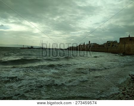 Overcast Skies On The Seafront. A Small Storm.